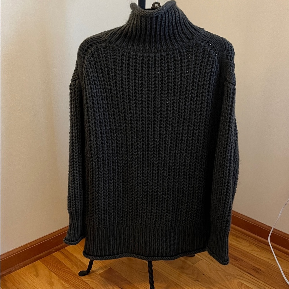 Chunky Roller Knit Turtleneck Sweater.